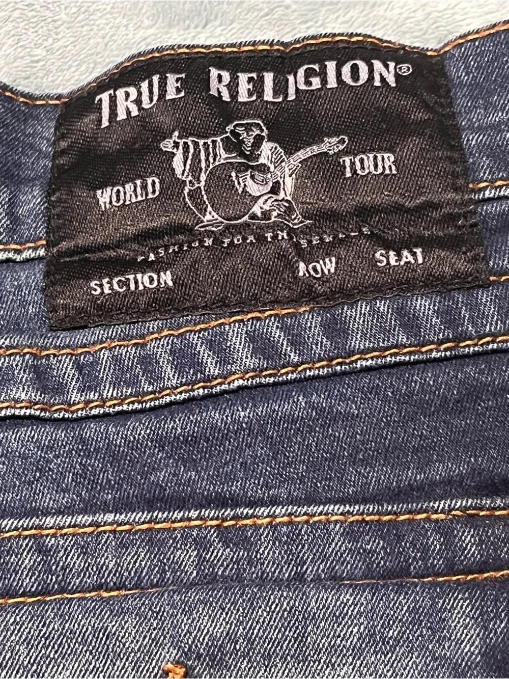 True Religion men’s Straight Leg Jeans in Dark Blue with Faded Detail